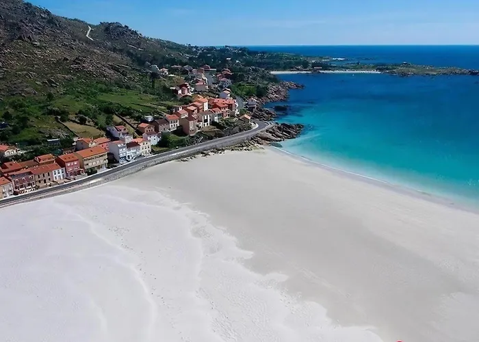 Апартаменты Acogedor Atico A Pie De Mar Y Montana. О-Пиндо